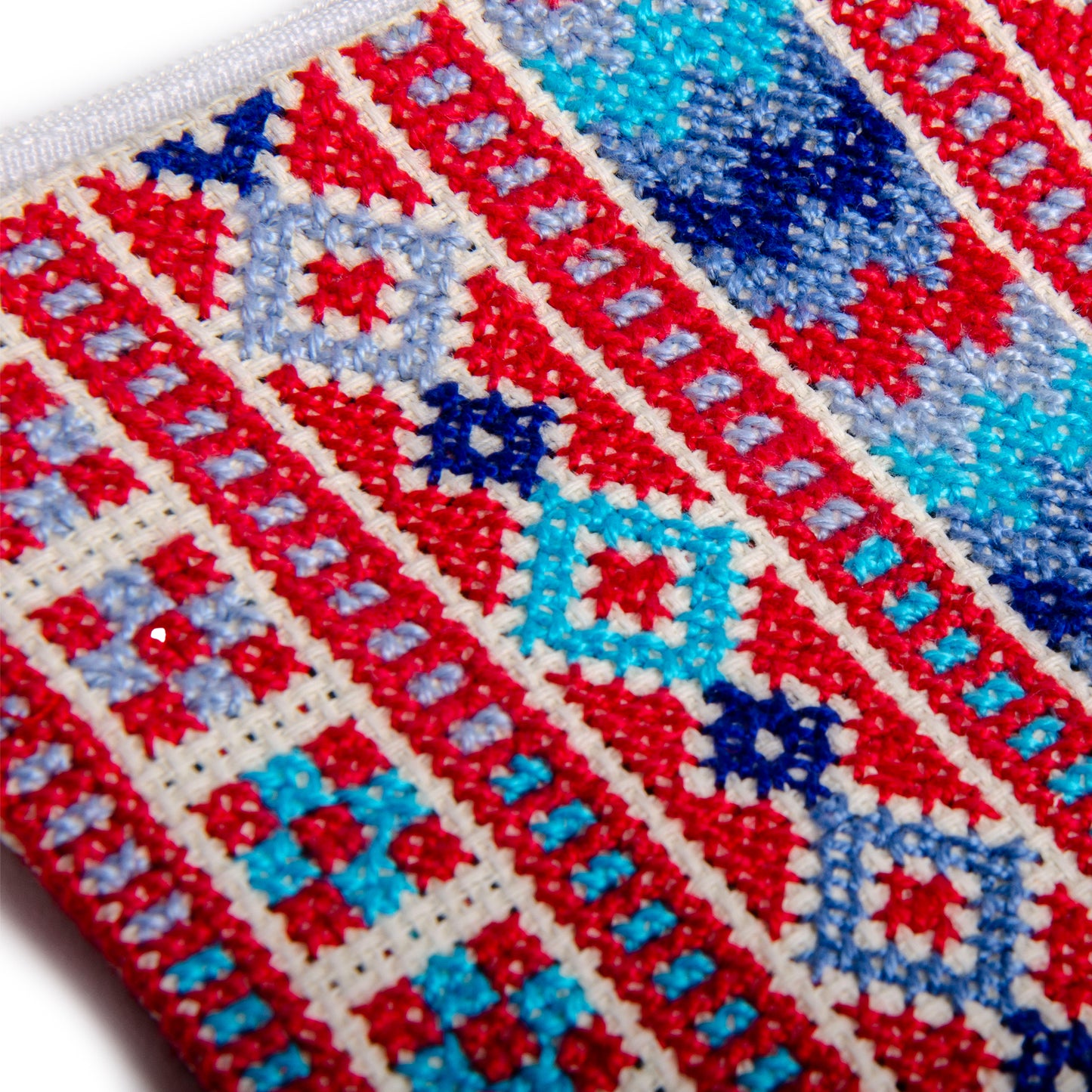 Handmade Palestinian embroidered purse with traditional Tatreez geometric patterns, size 12x11 cm.