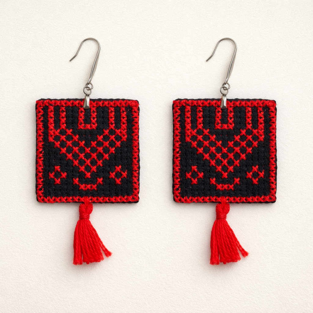 Ramallah thobe panel inspired Palestinian Tatreez embroidered earrings with red tassel flat lay