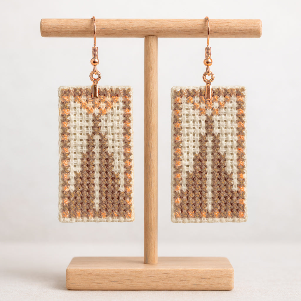 Front view of Sarwa cypress tree Ashdod tatreez earrings with traditional Palestinian embroidery pattern