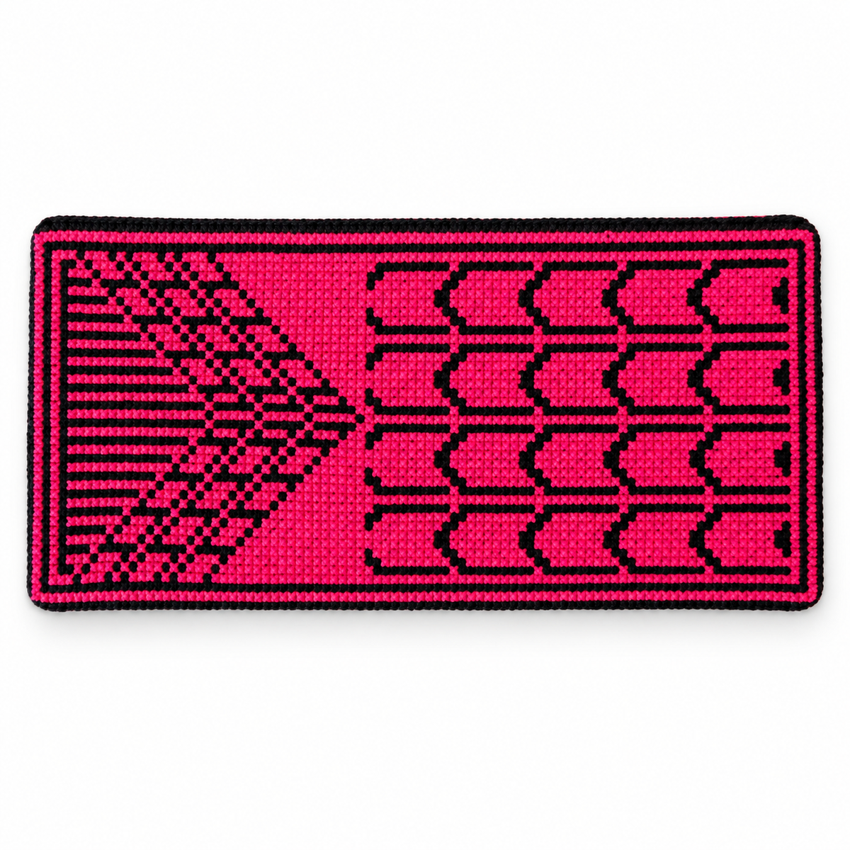 Top view of the handmade Sabla eyeglasses case, showcasing its red Palestinian Tatreez embroidery arranged in a traditional geometric pattern on black fabric.