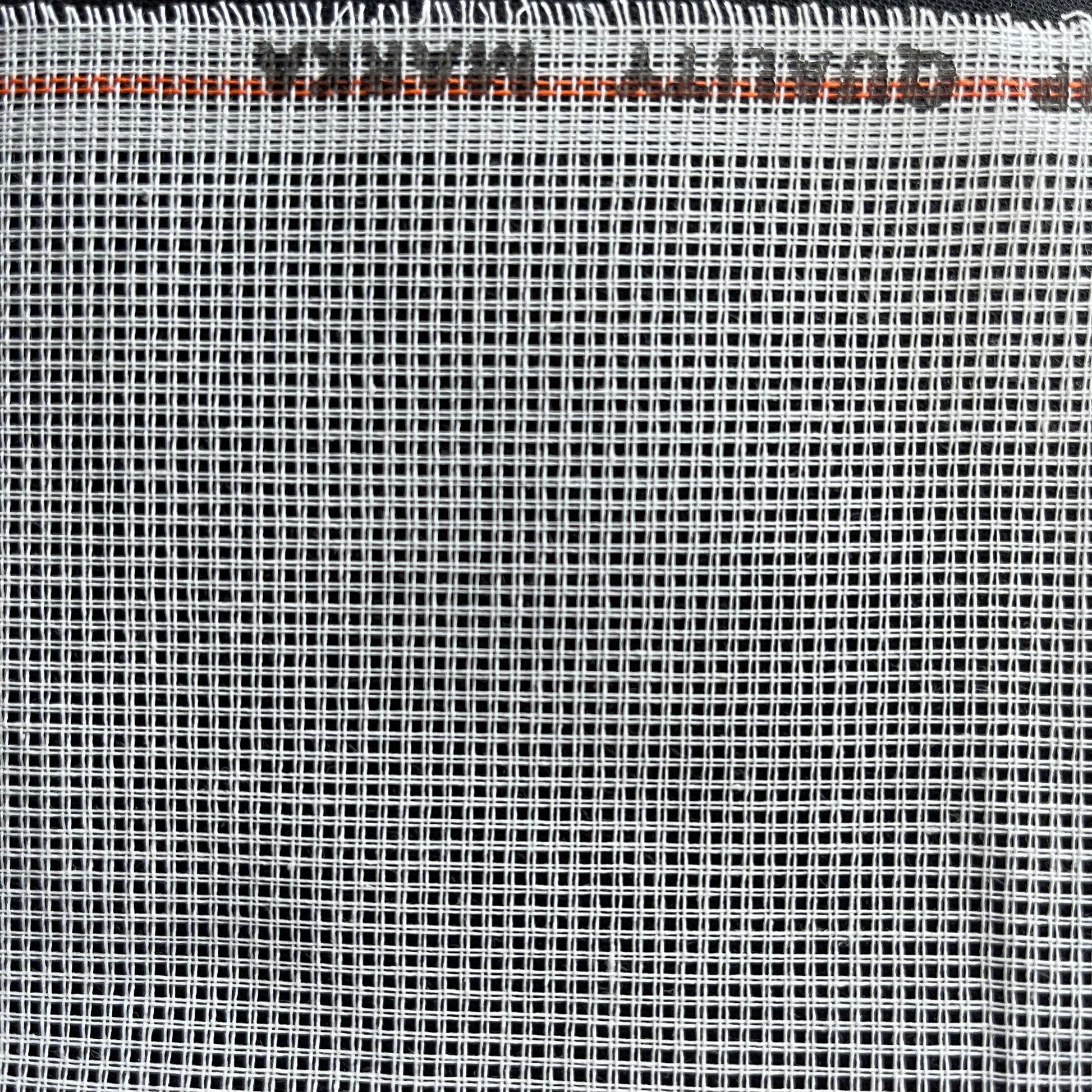 Close-up of white 11ct waste canvas grid for embroidery stitching