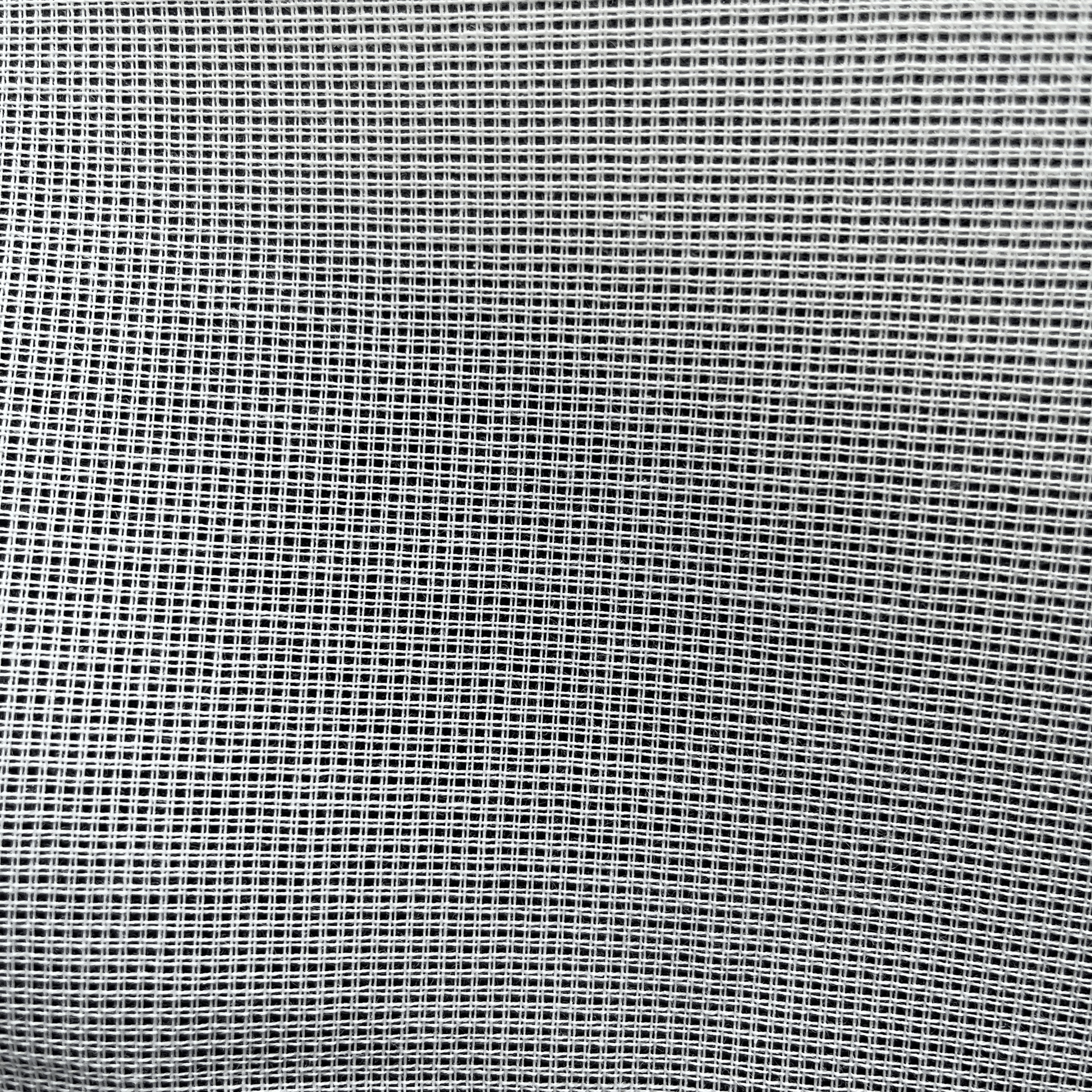 Close-up of white 14ct waste canvas grid for embroidery stitching