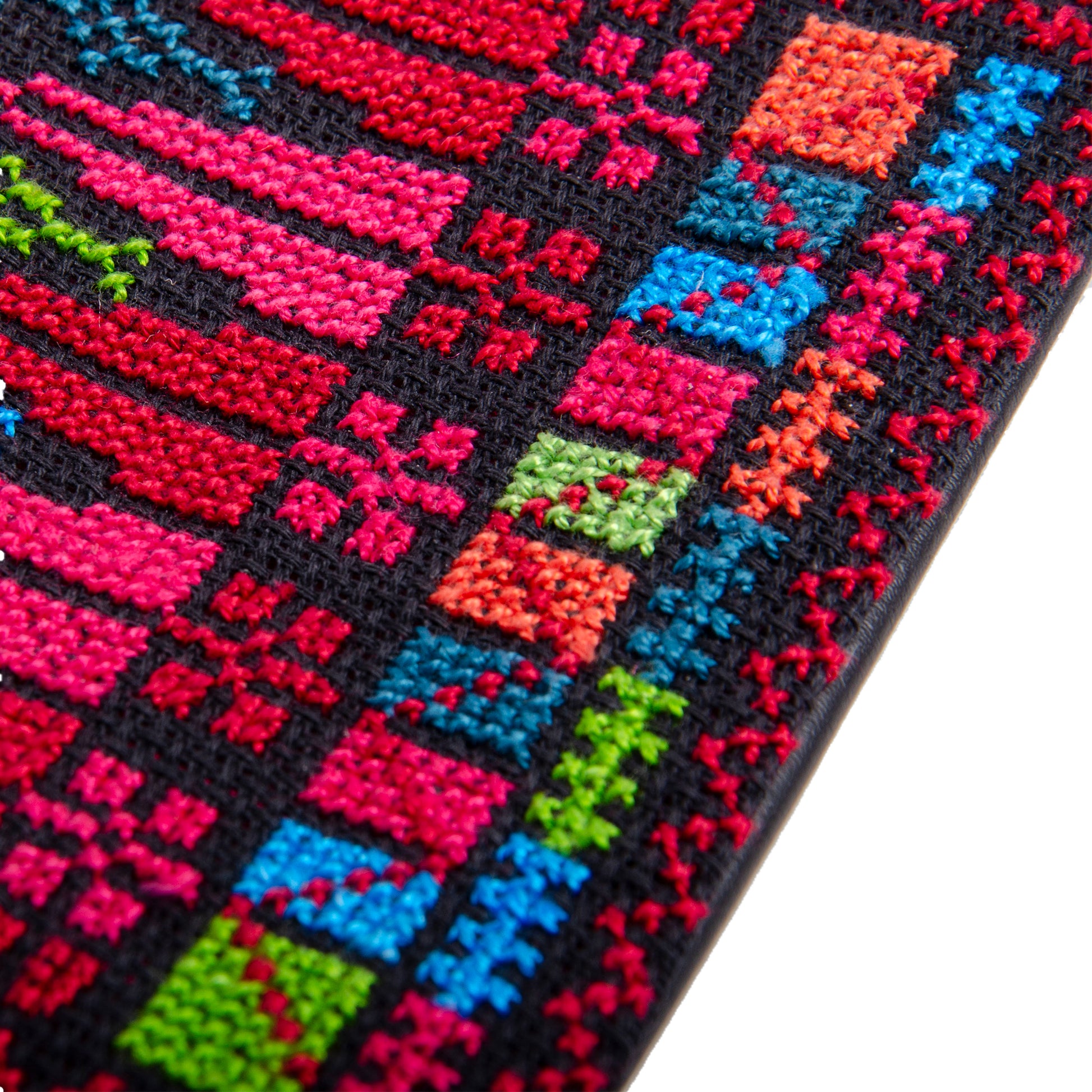 Close-up of handmade Palestinian embroidered purse with traditional Tatreez cypress motif, size 15x10 cm.